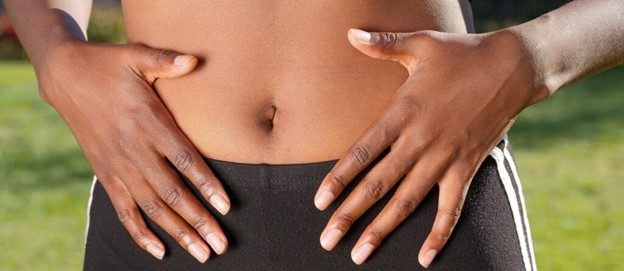 Close up of a woman's flat, toned tummy (model)