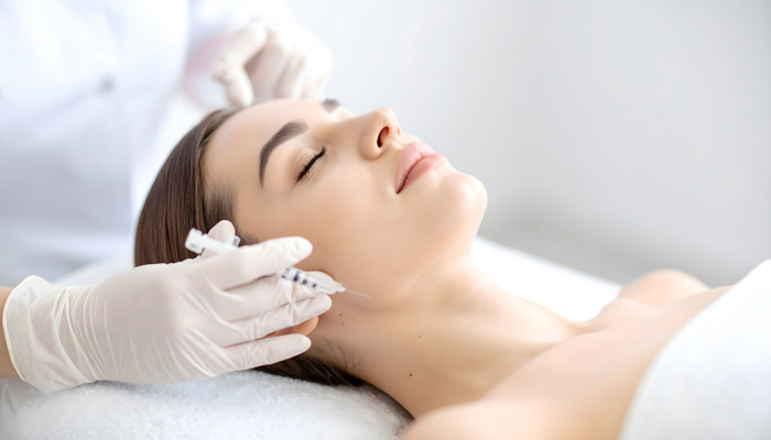 Patient receiving an injectable treatment to improve facial definition and create a smoother, more youthful appearance.